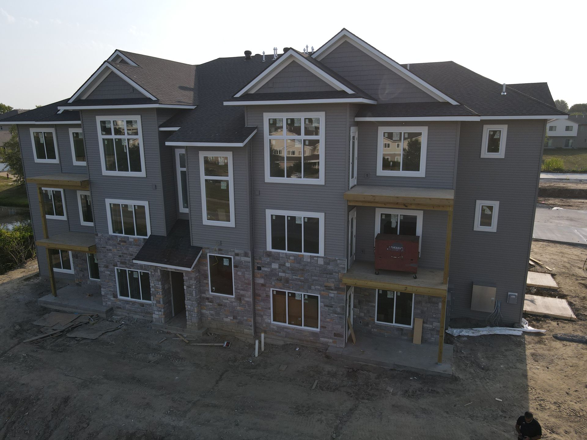 An aerial view of a large apartment building under construction