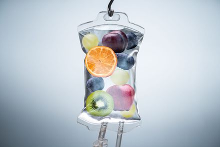 A bag of fruit is being injected into a person 's body.