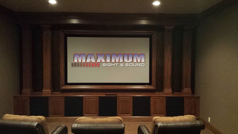 Home theater with a screen displaying