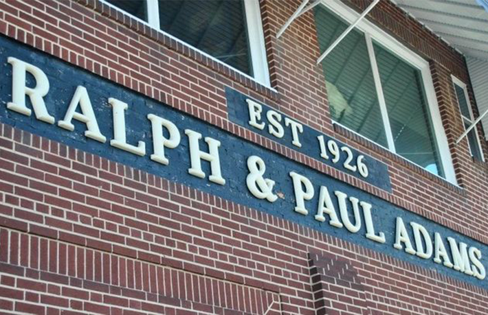 Ralph and Paul Adams sign