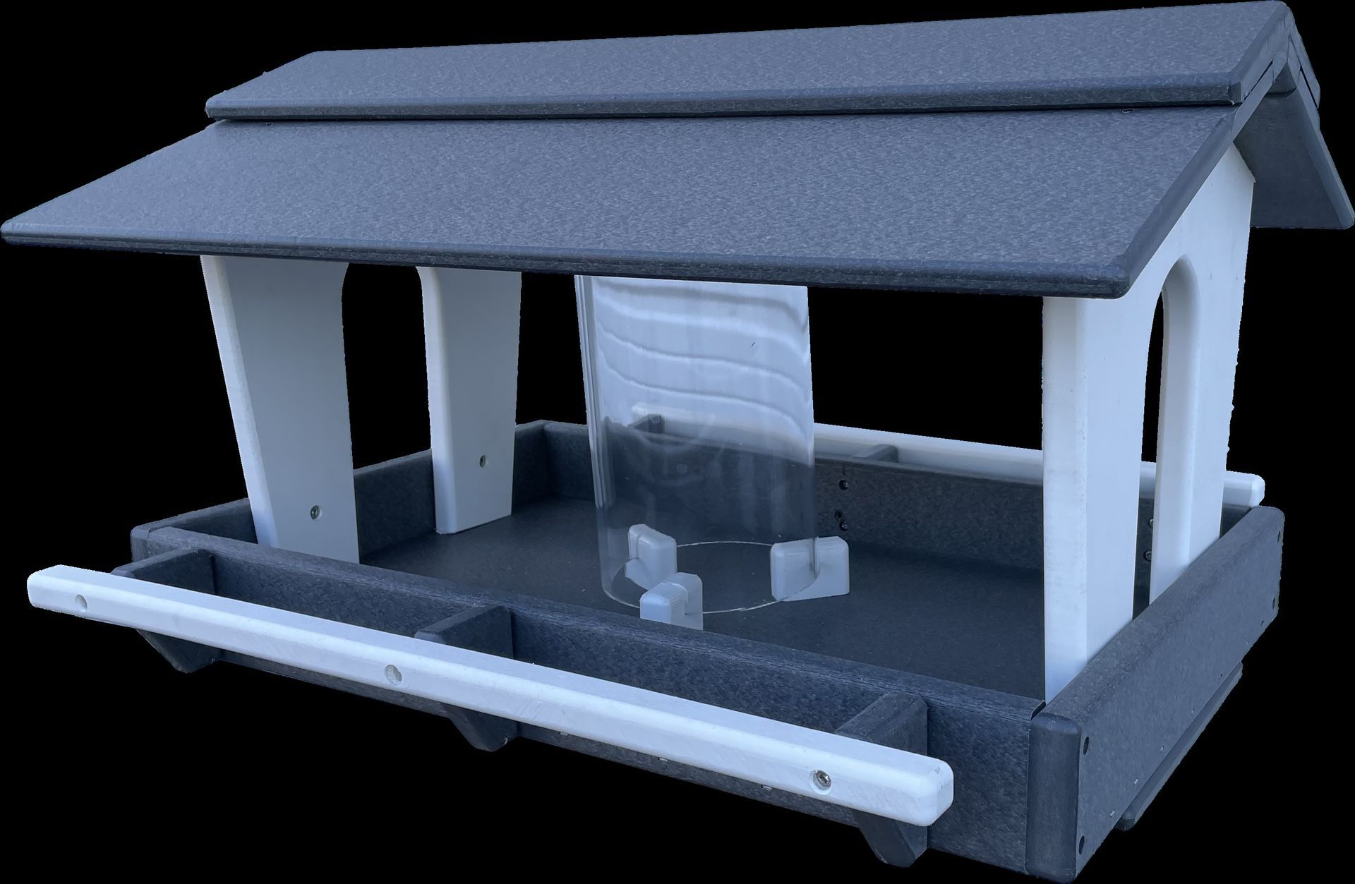 A bird feeder with a glass in the middle of it