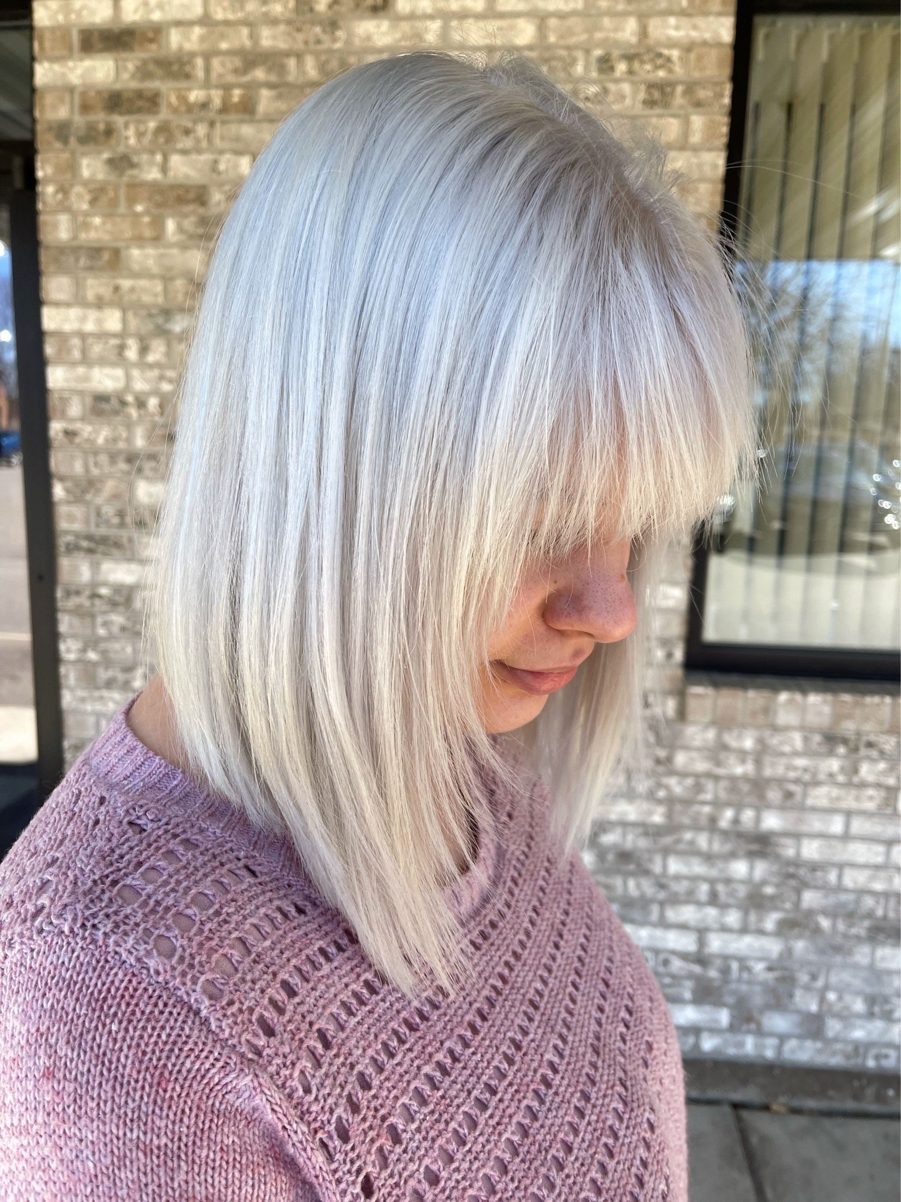 short blonde hairstyle with bangs