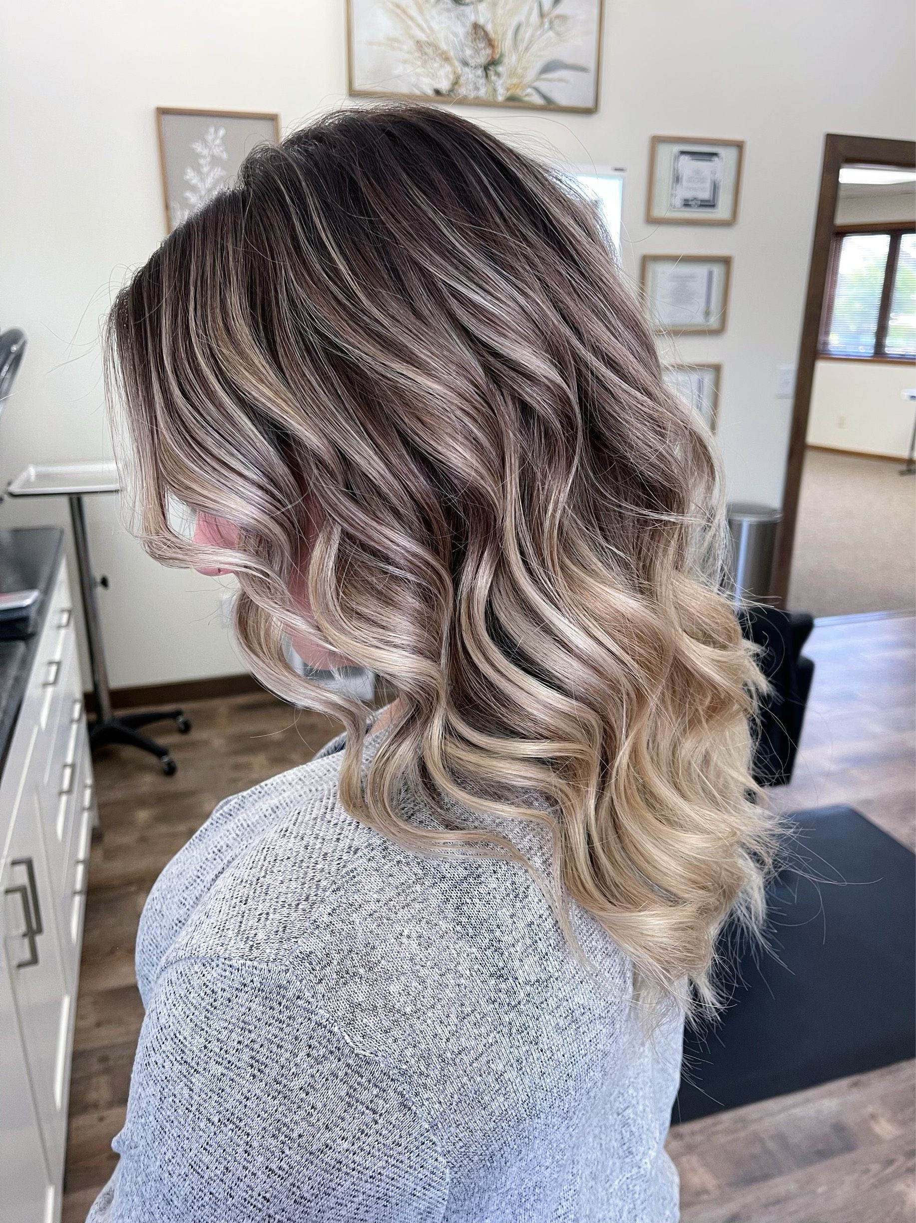 Mid length balayage wavy hairstyle