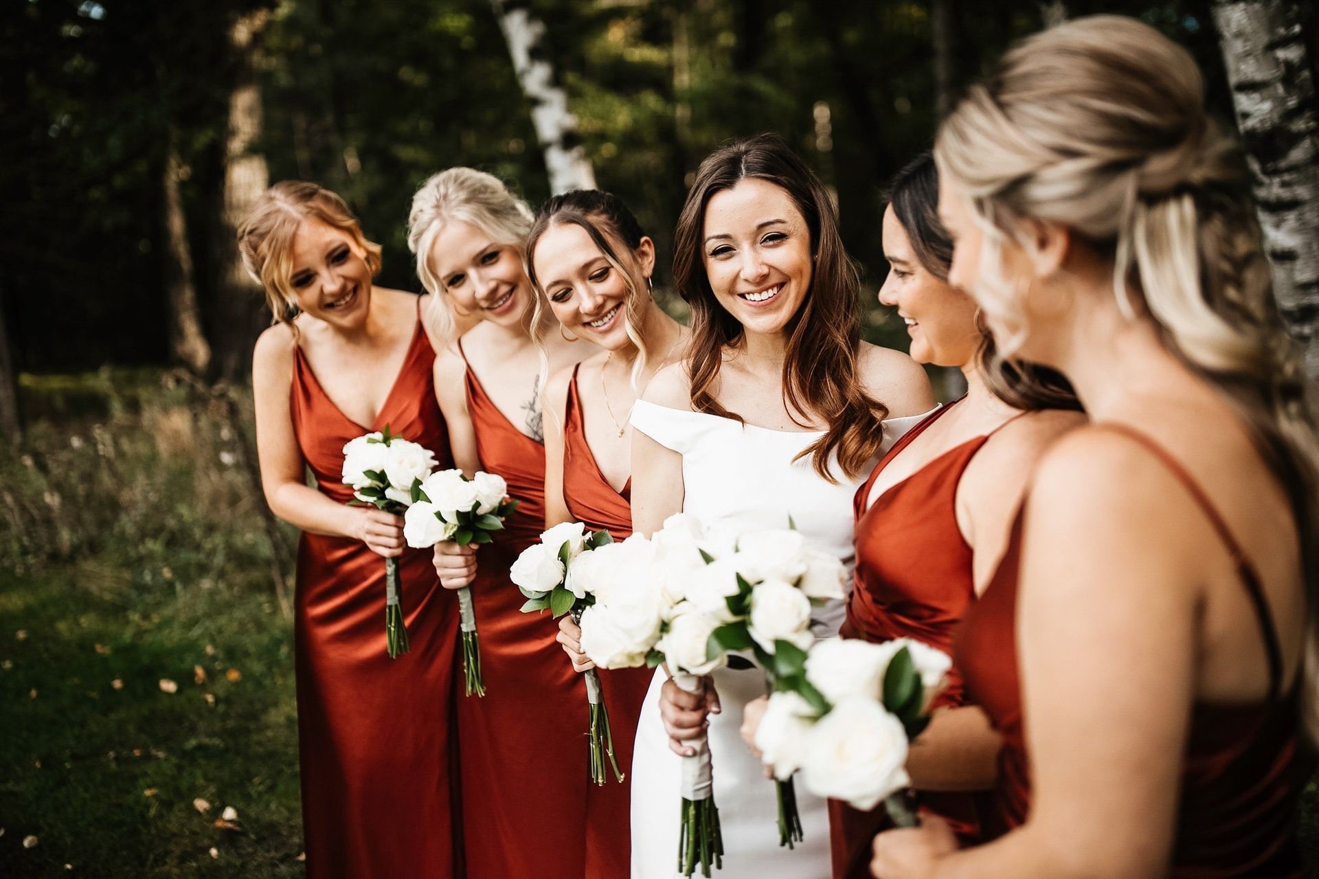 Beautiful bride with her bridesmaids