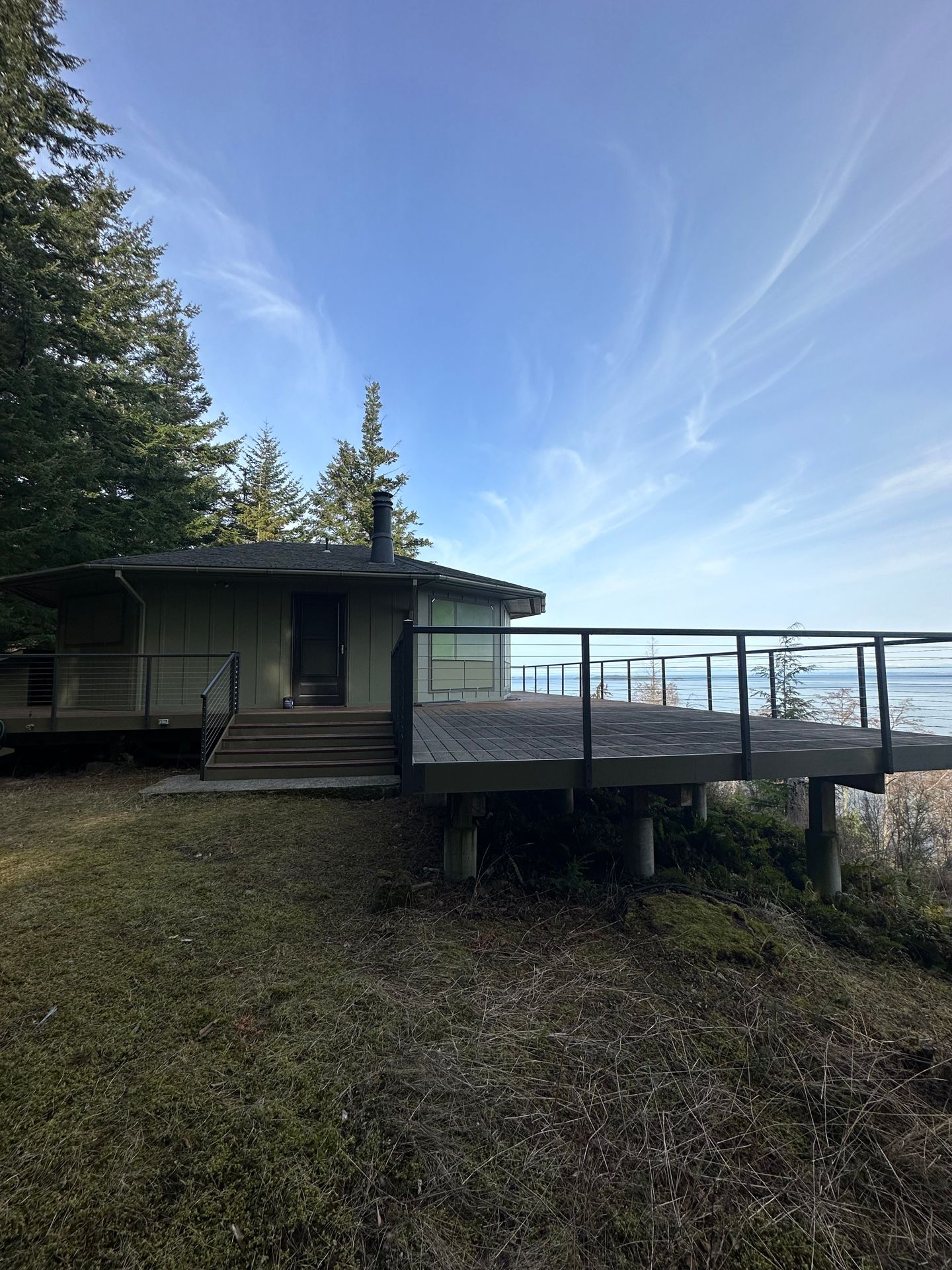 Newly installed gray & green deck