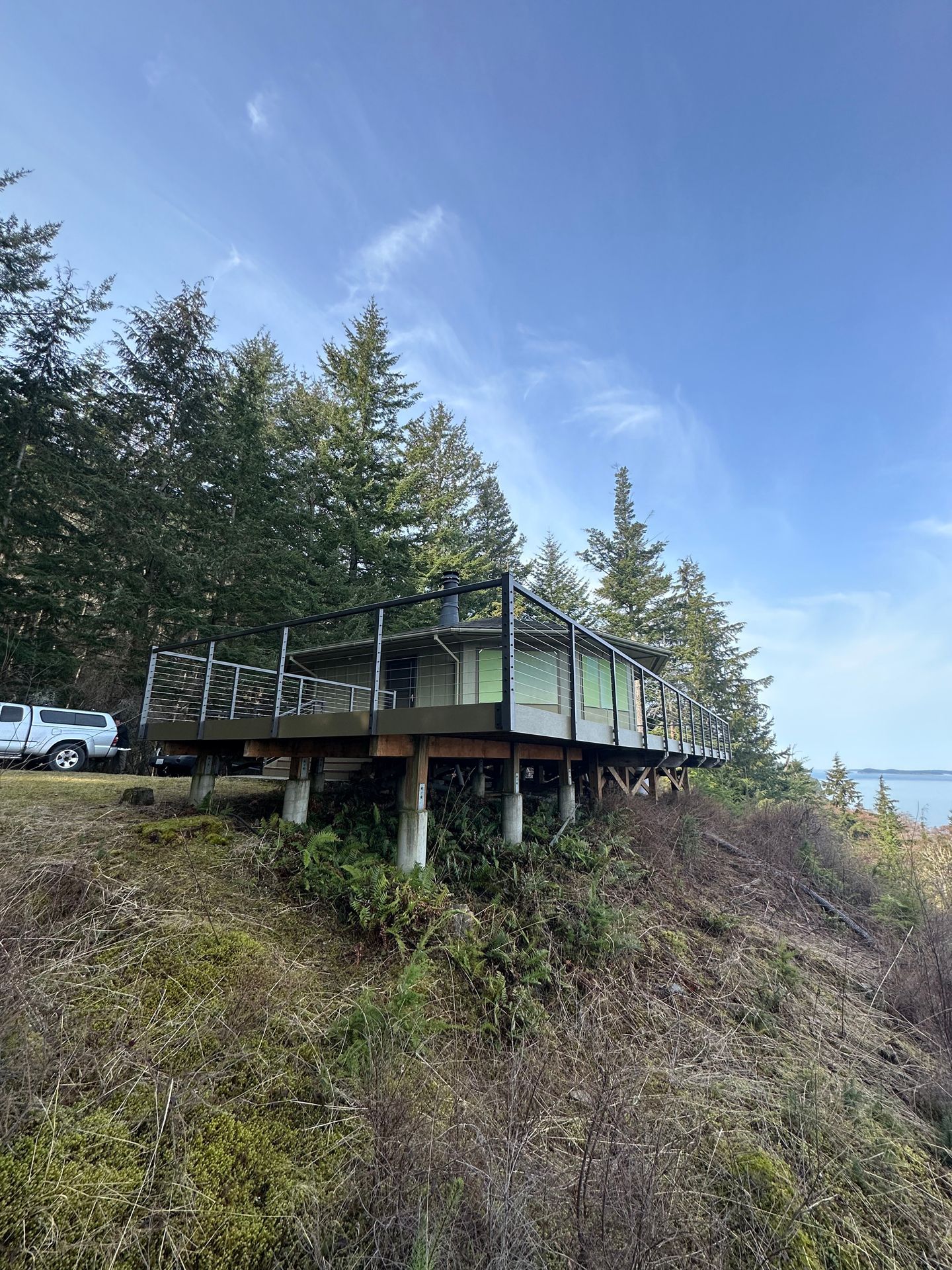 Newly installed gray & green deck & railing