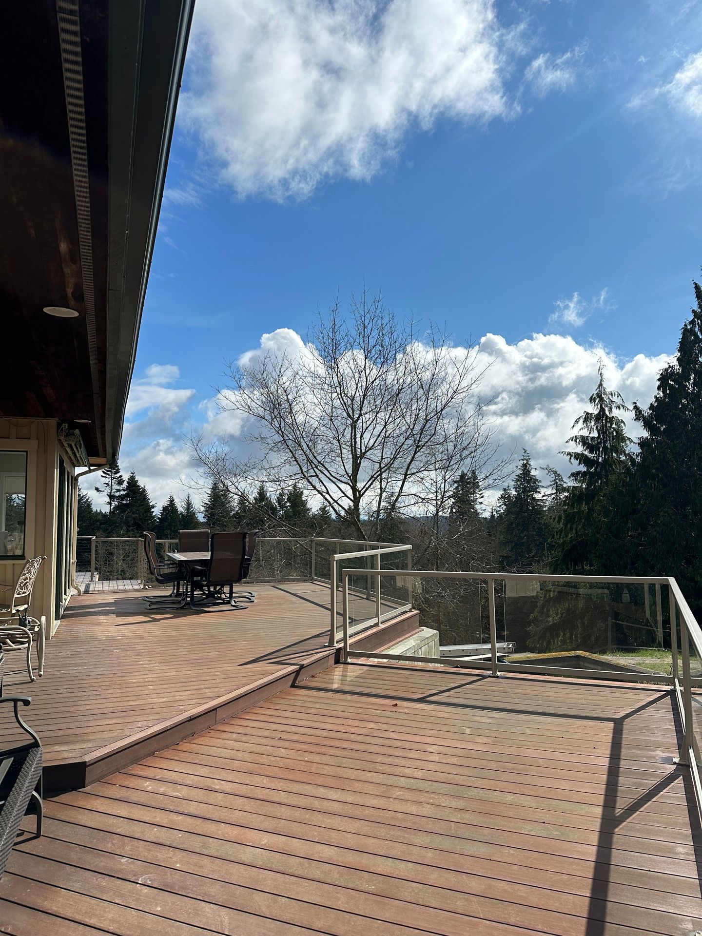 Newly built glass railing with white post