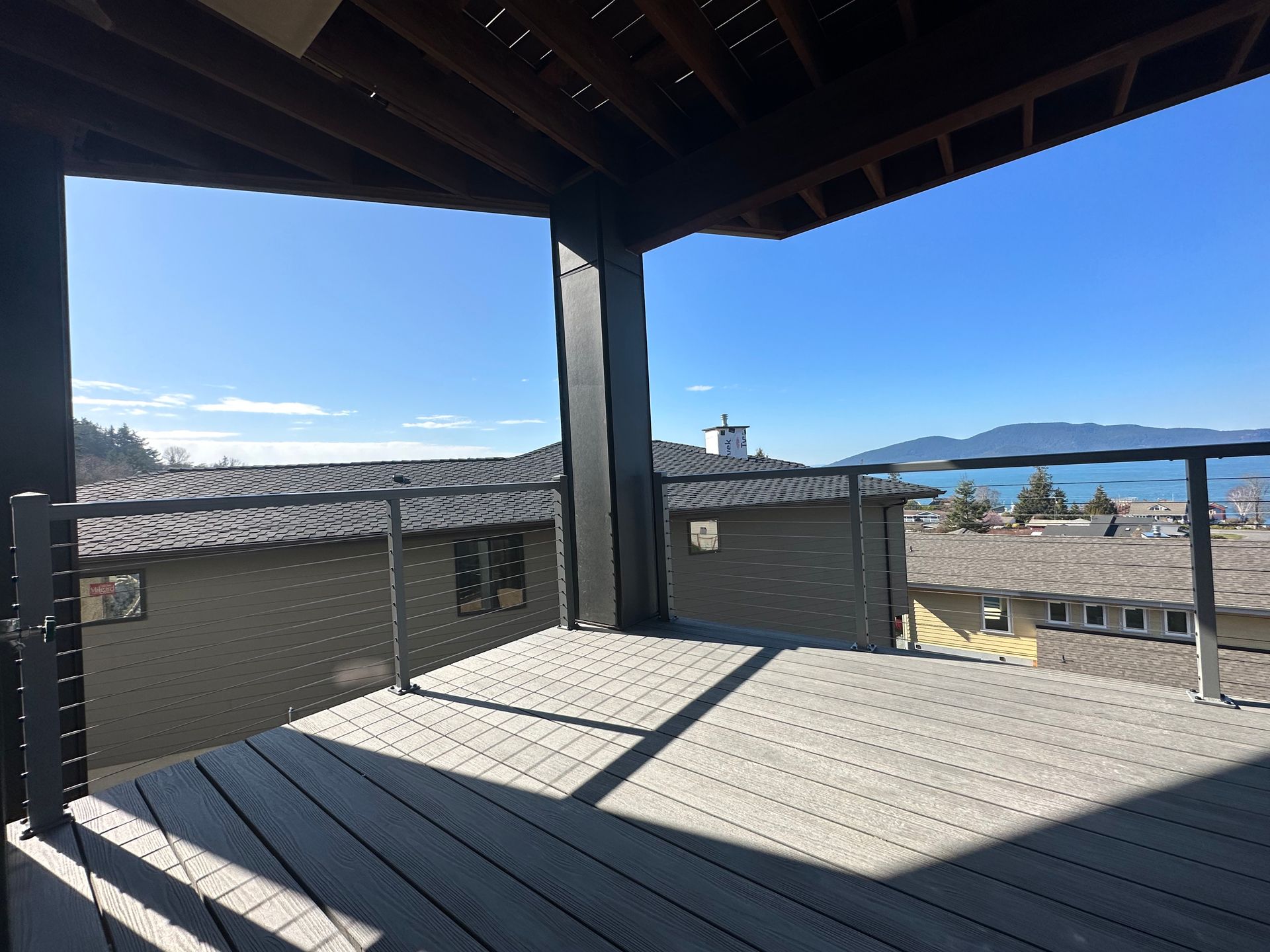 New custom built gray deck & railing