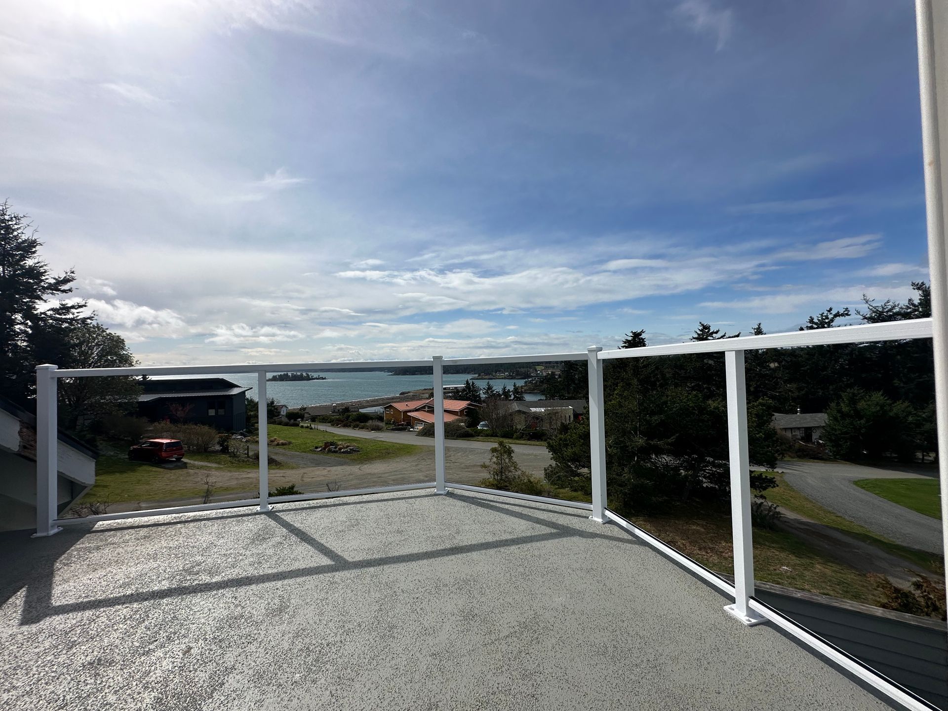 Newly installed white glass railings