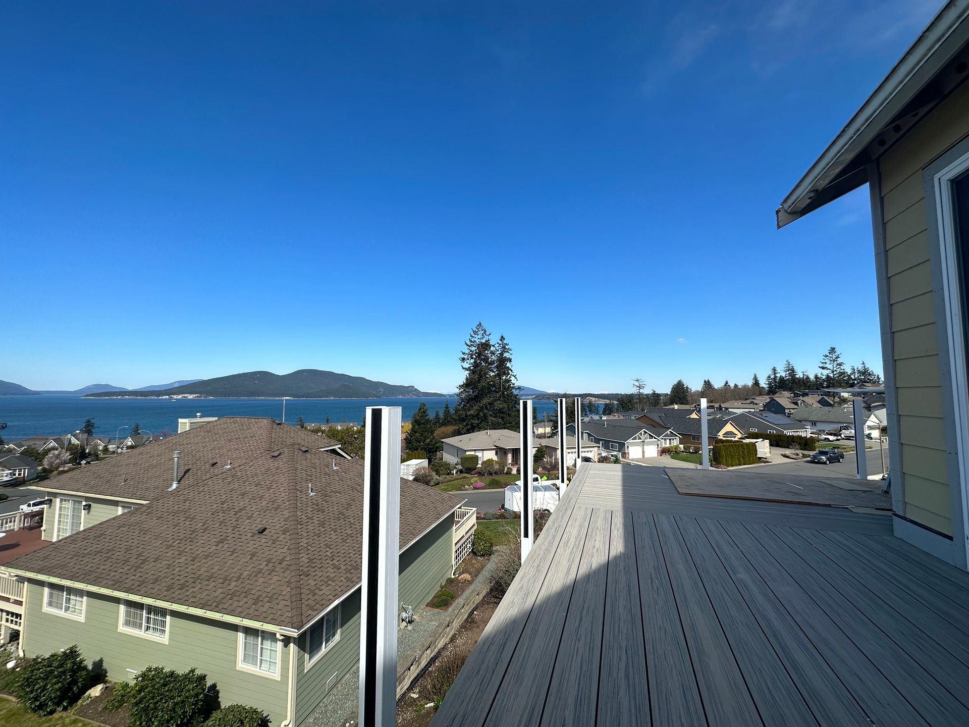 Glass railing post installation in progress