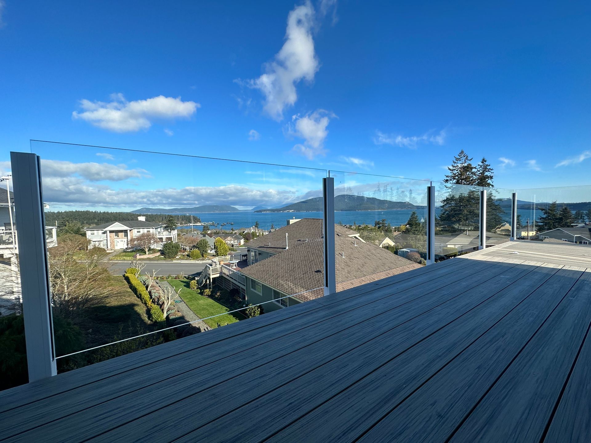 Installed white glass railing