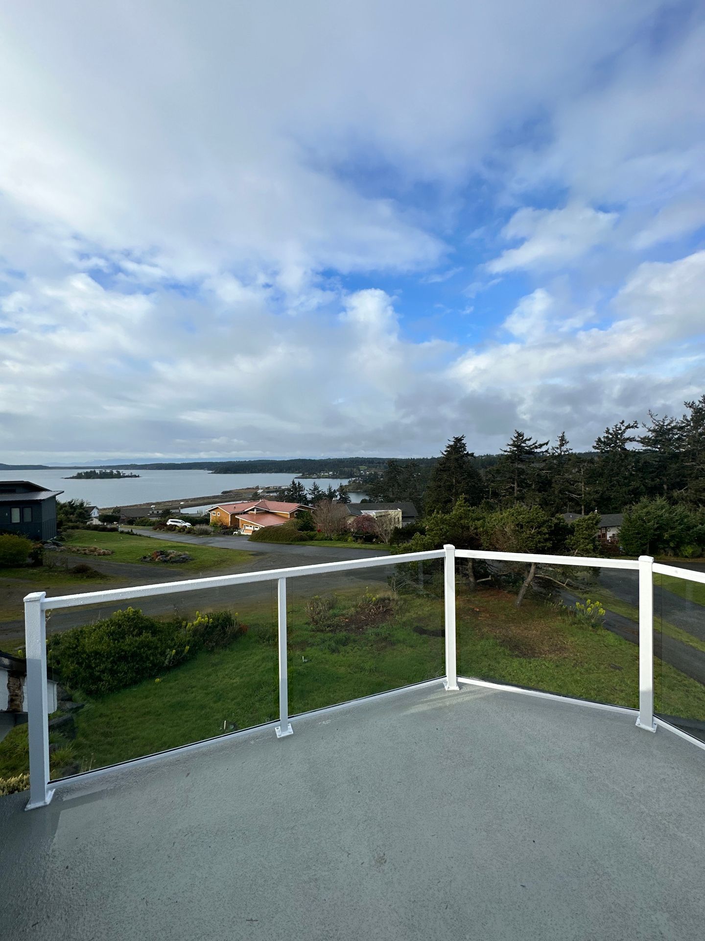 White posts and glass railings