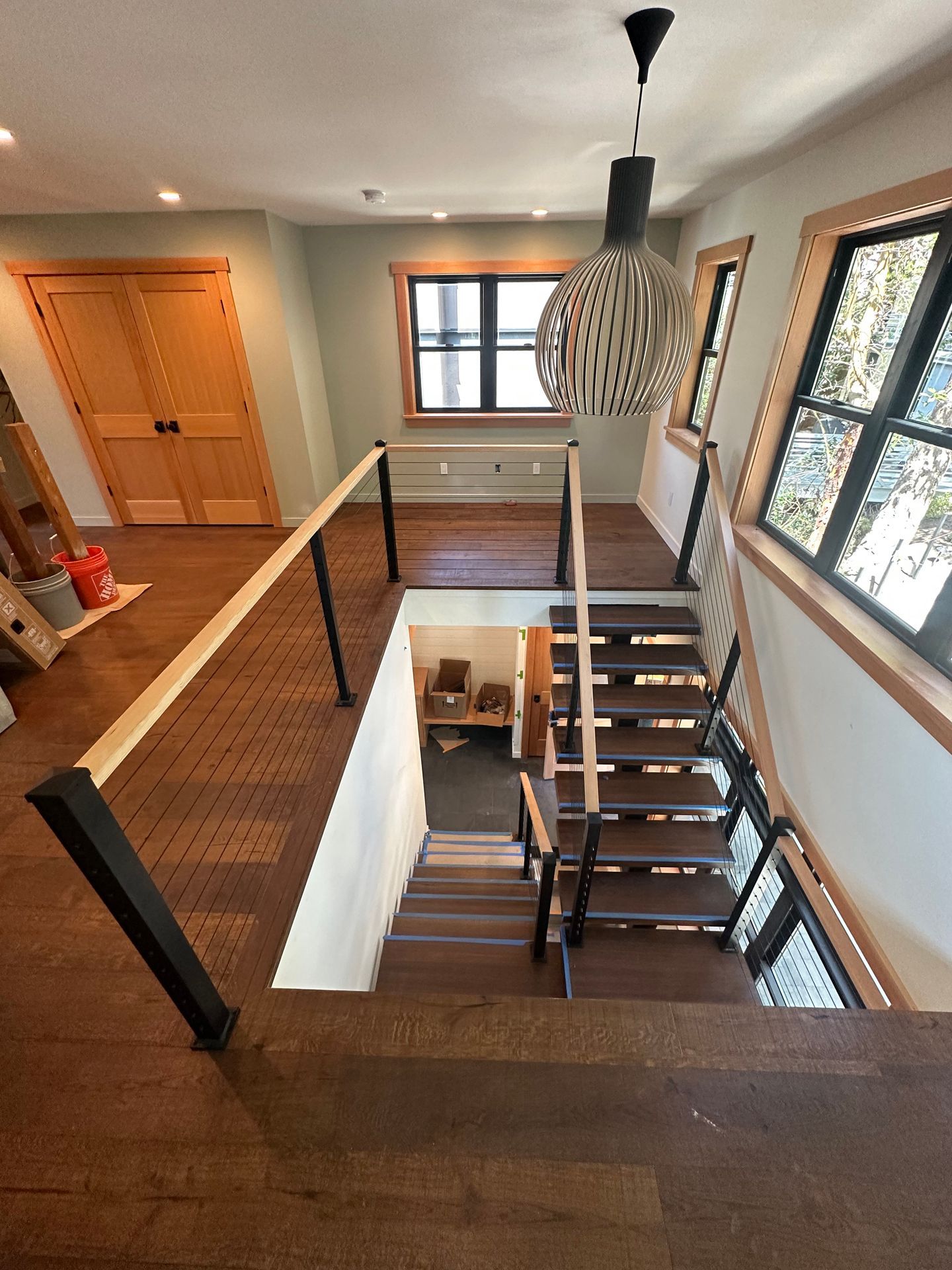 Newly built wood stair with cable railing