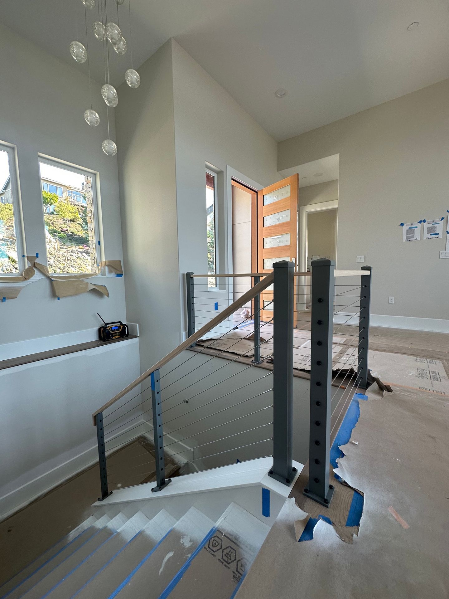 Wood stair with gray railings