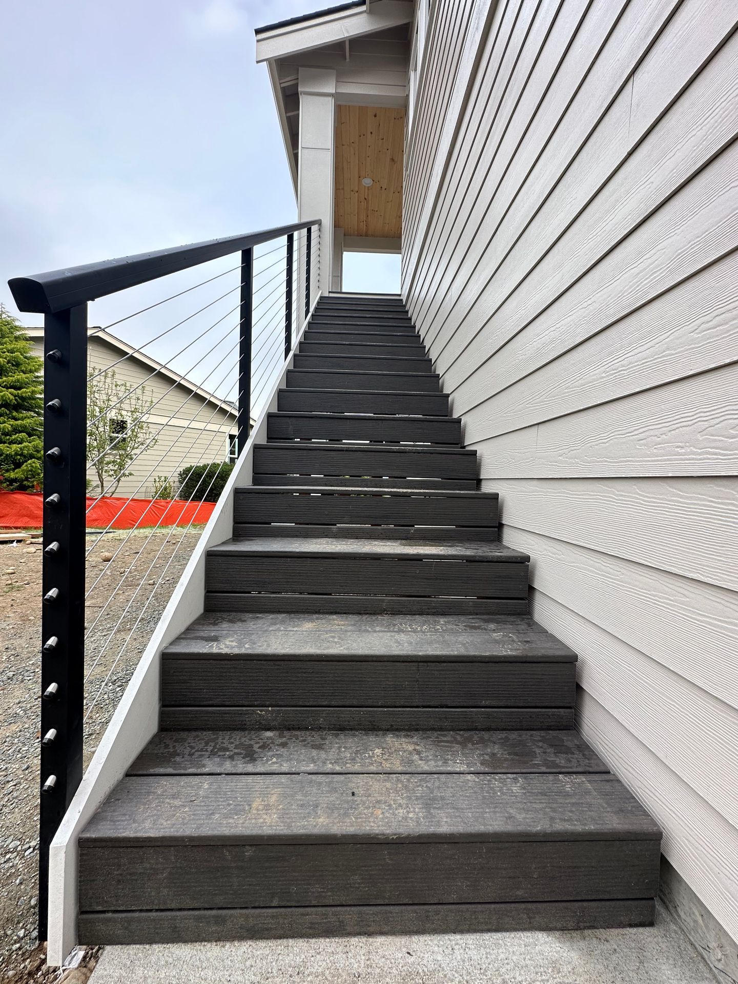 Black stair cable railing installation