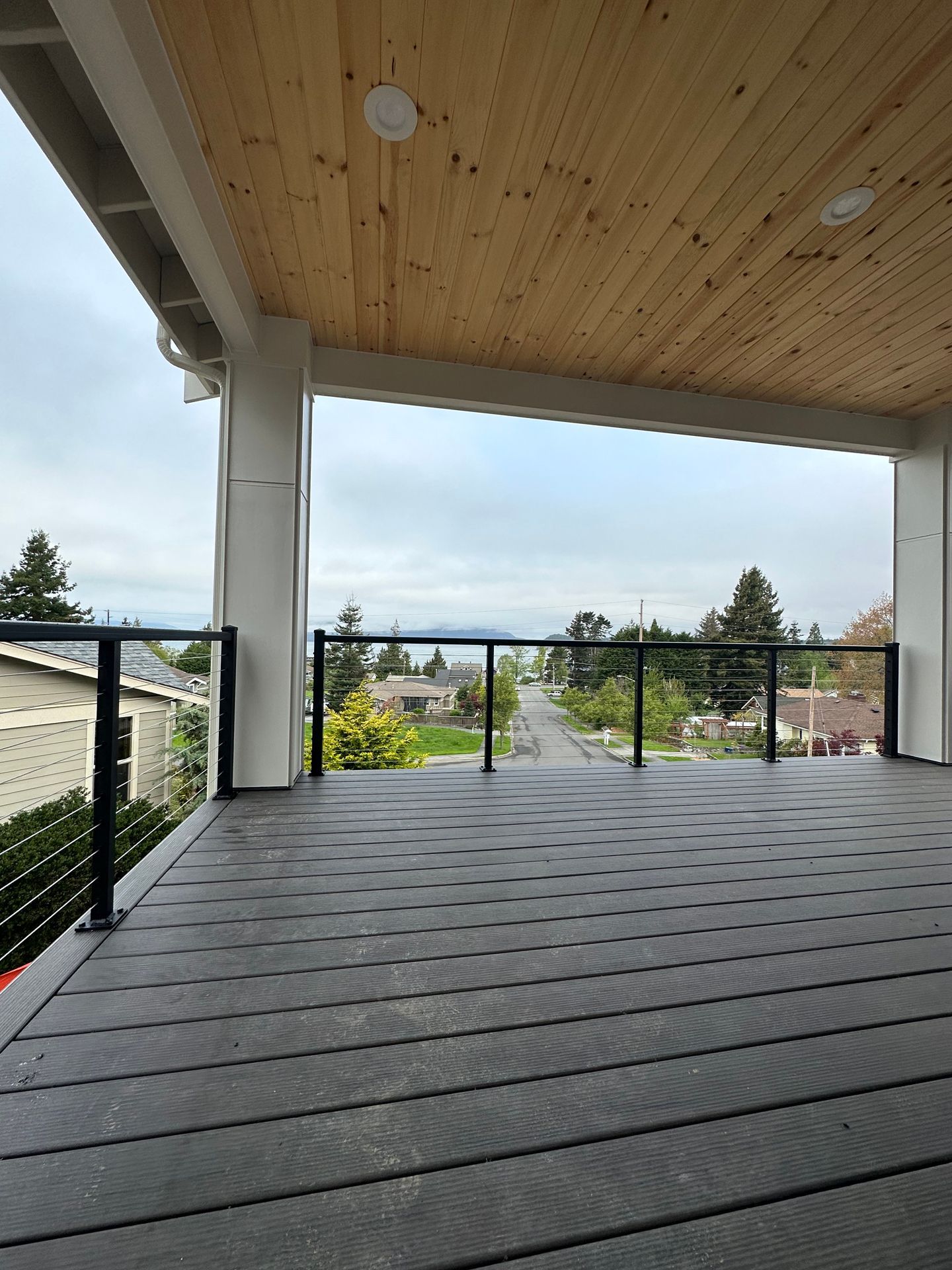 Newly installed black cable railing