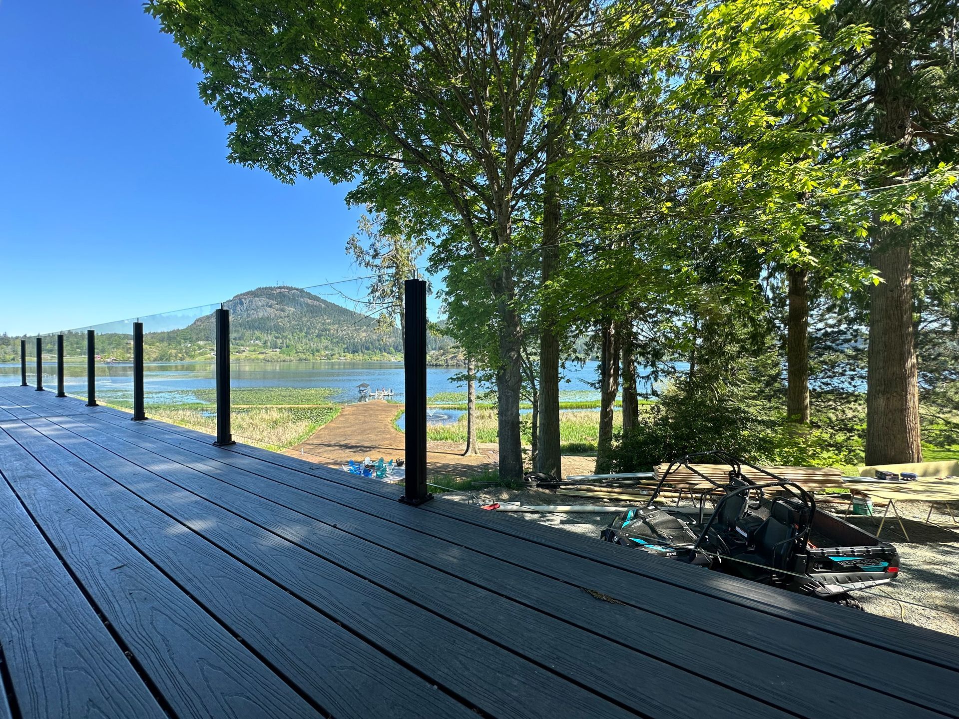 Custom-built deck floor and glass railing