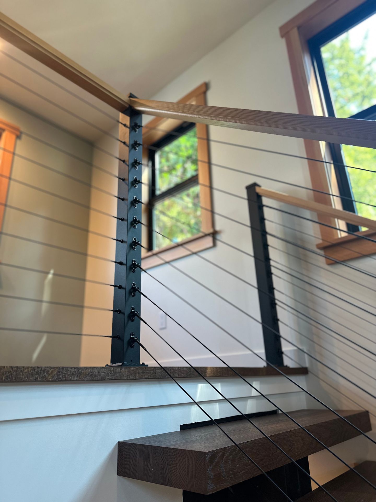 Black cable railing systems installed