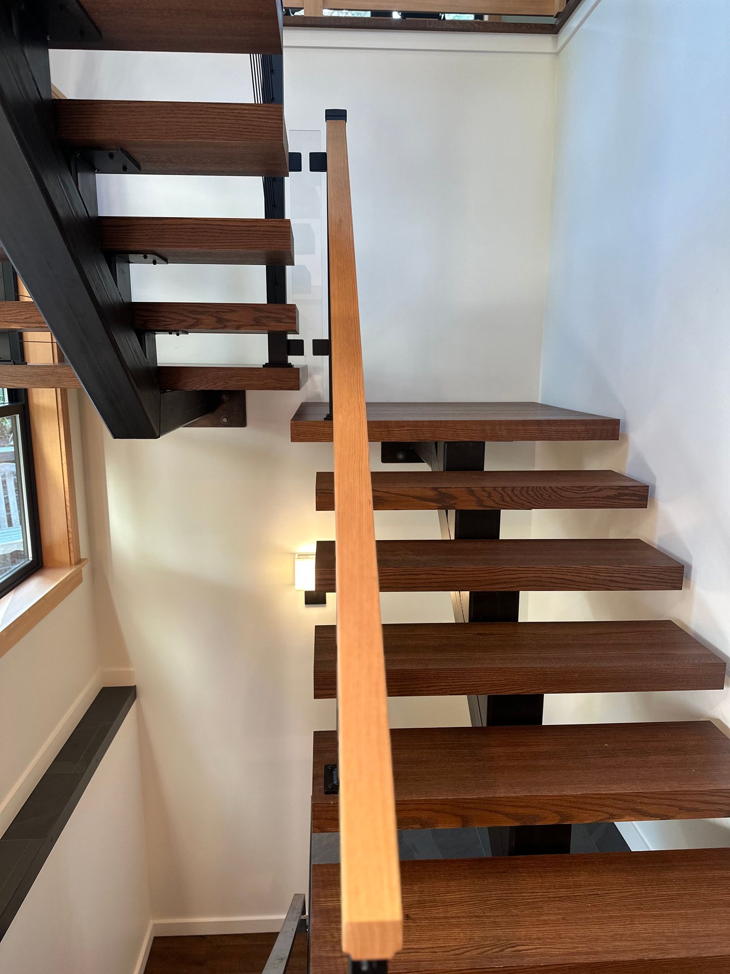Black stair and railing systems installation