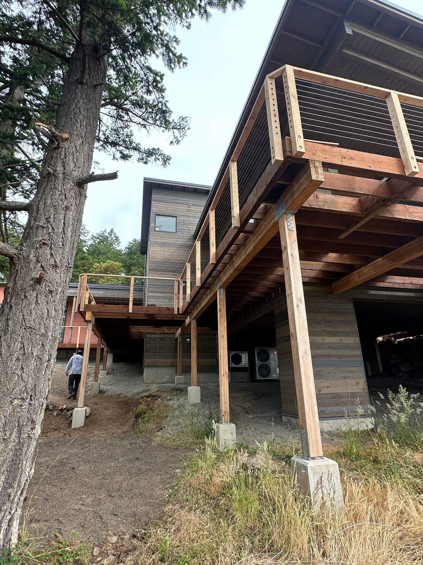 Custom cable railing system installation in progress