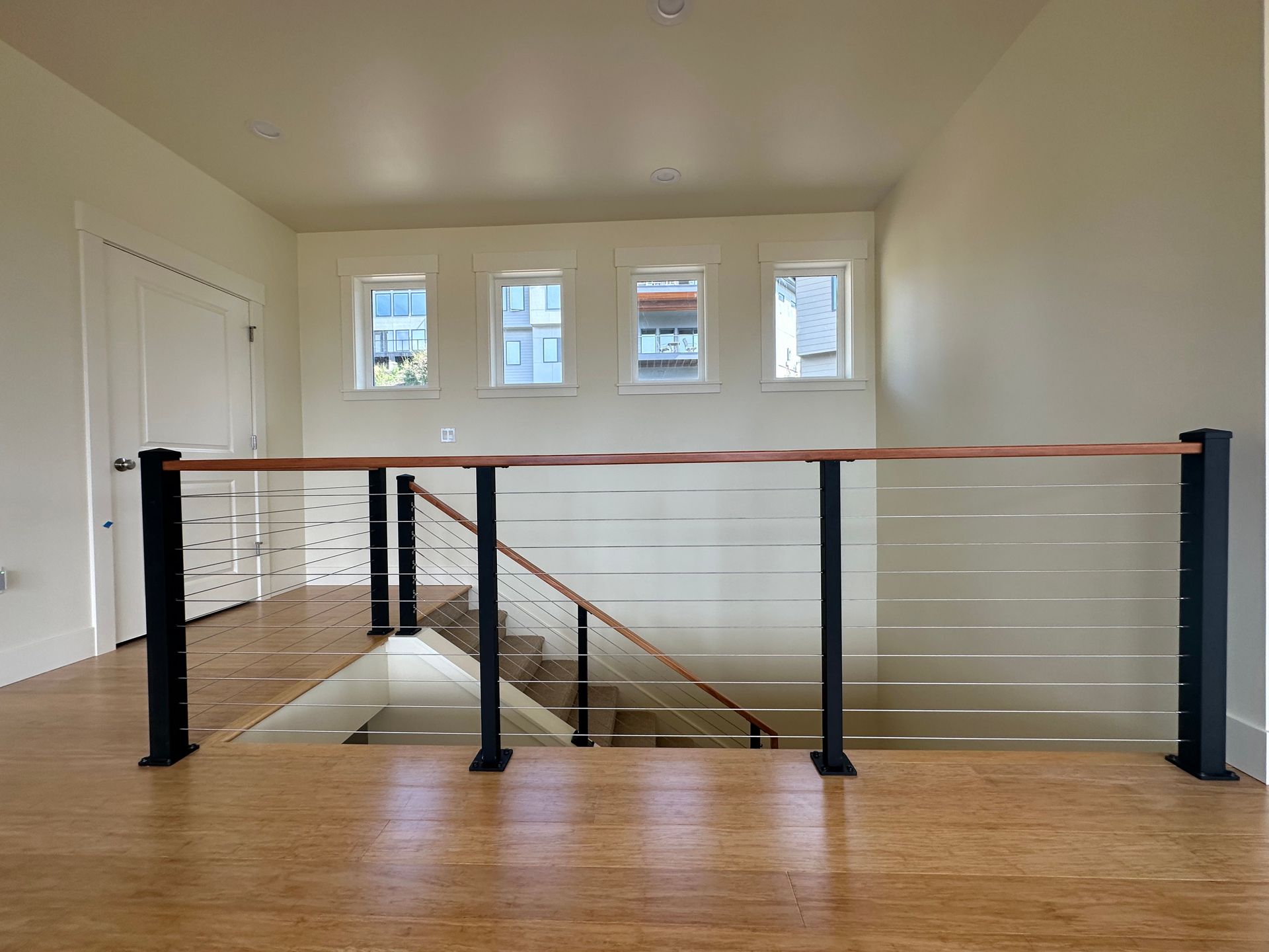 New wood stairs with cable railings