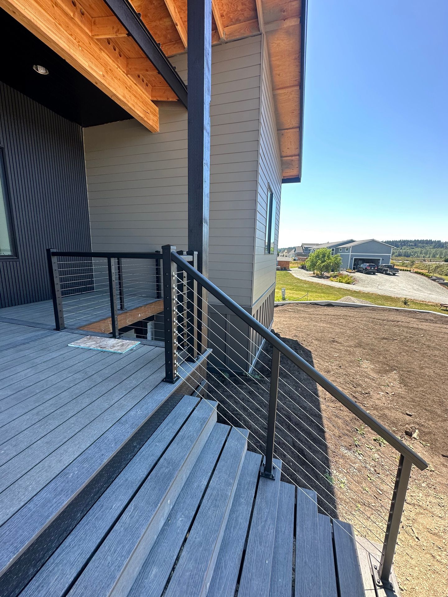 Gray steps with cable railing