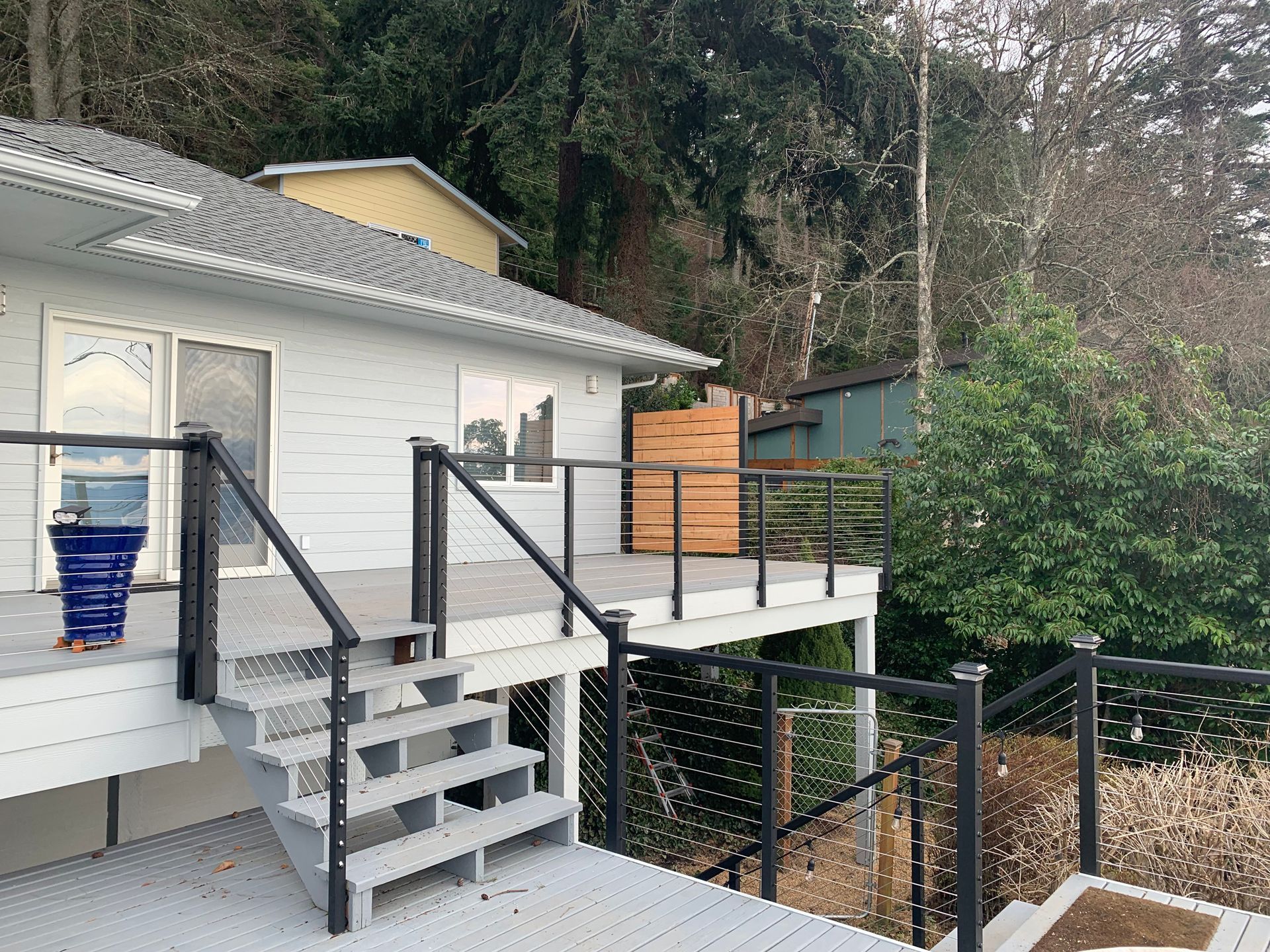 Custom wood steps and cable railings