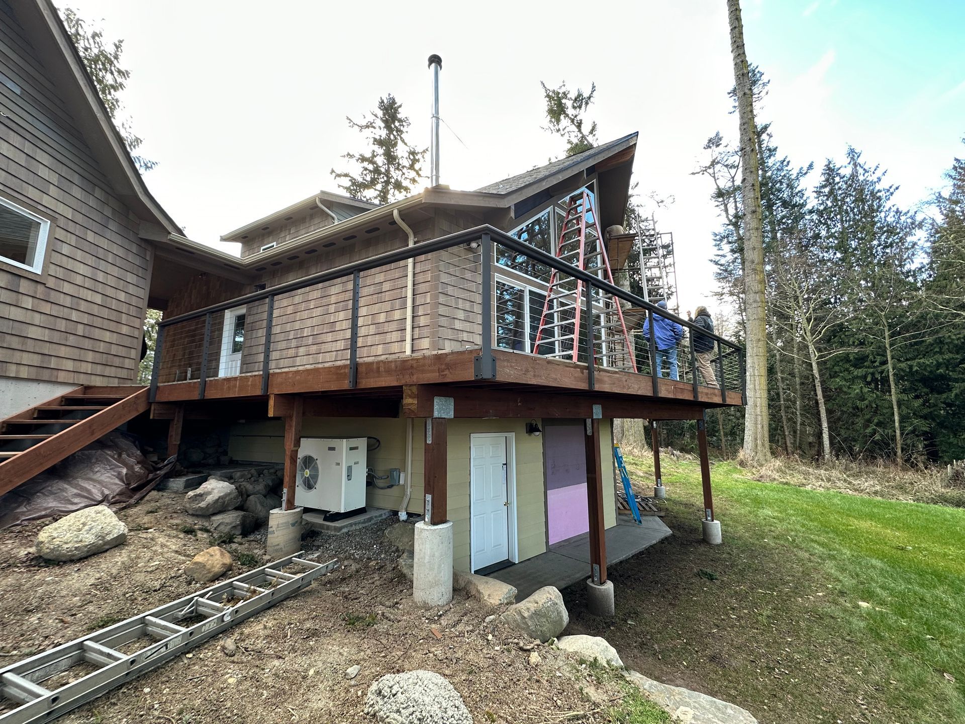 Deck and stainless-steel railing construction in progress