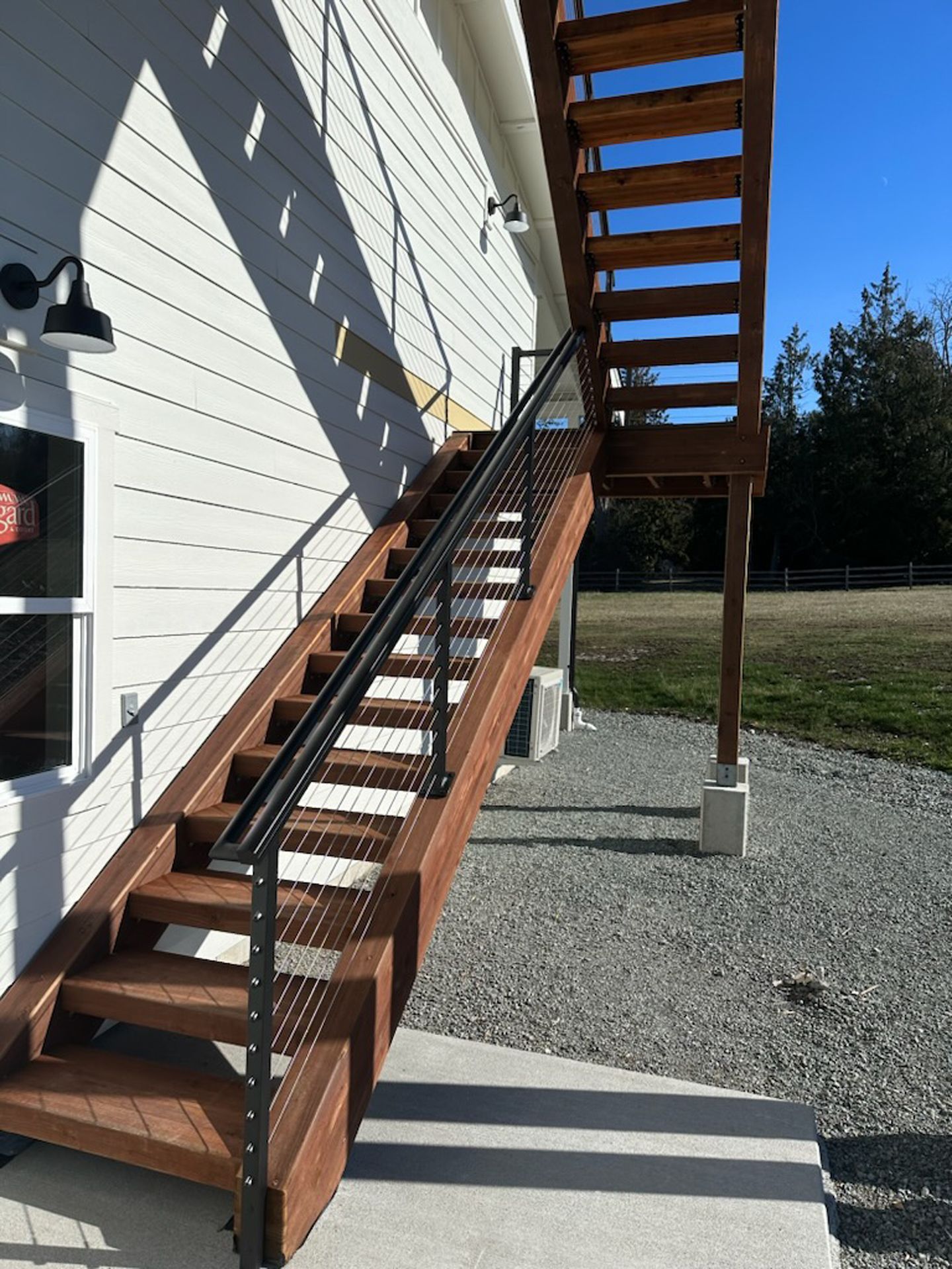 Beautiful stair and black stainless-steel cable railing