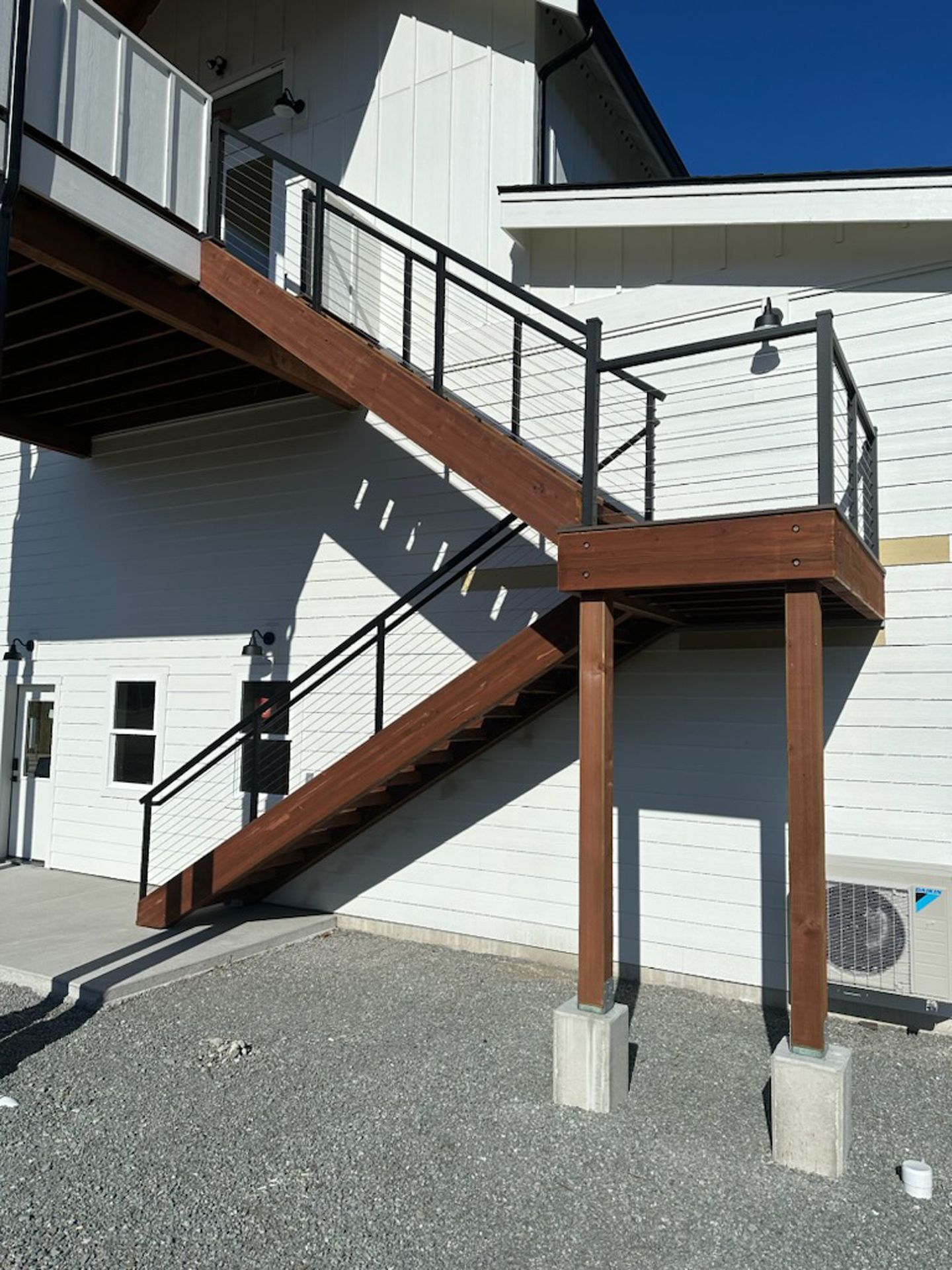 Beautiful stair and black stainless-steel cable railings