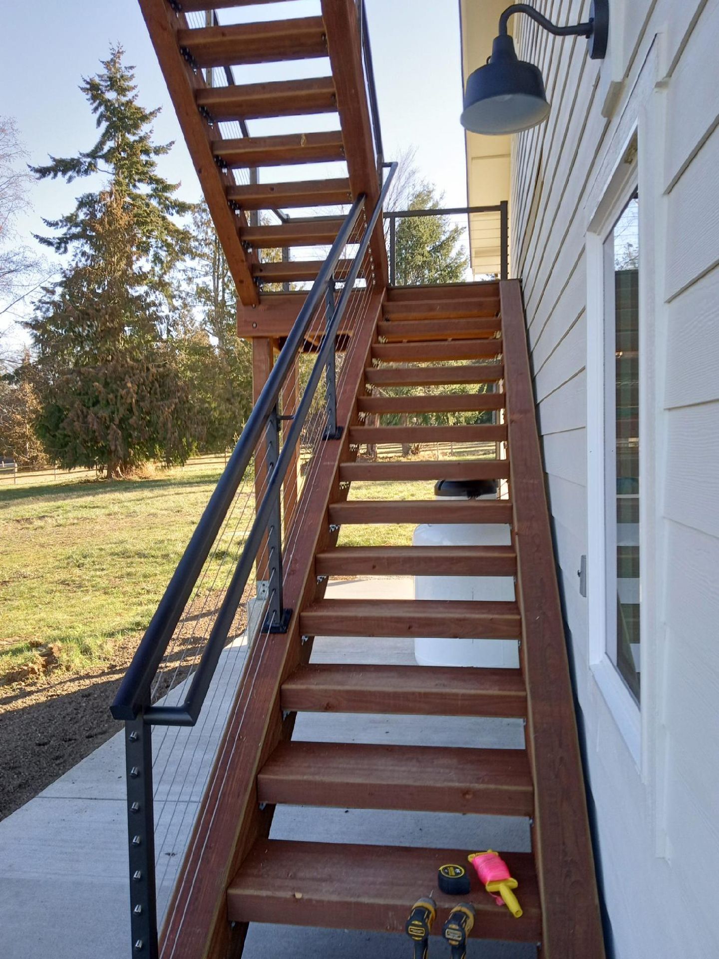Custom-made black stair railing system