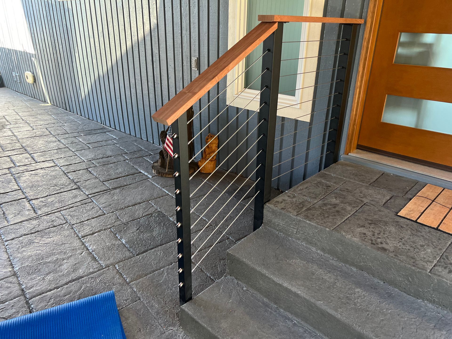 Newly installed black stair railing