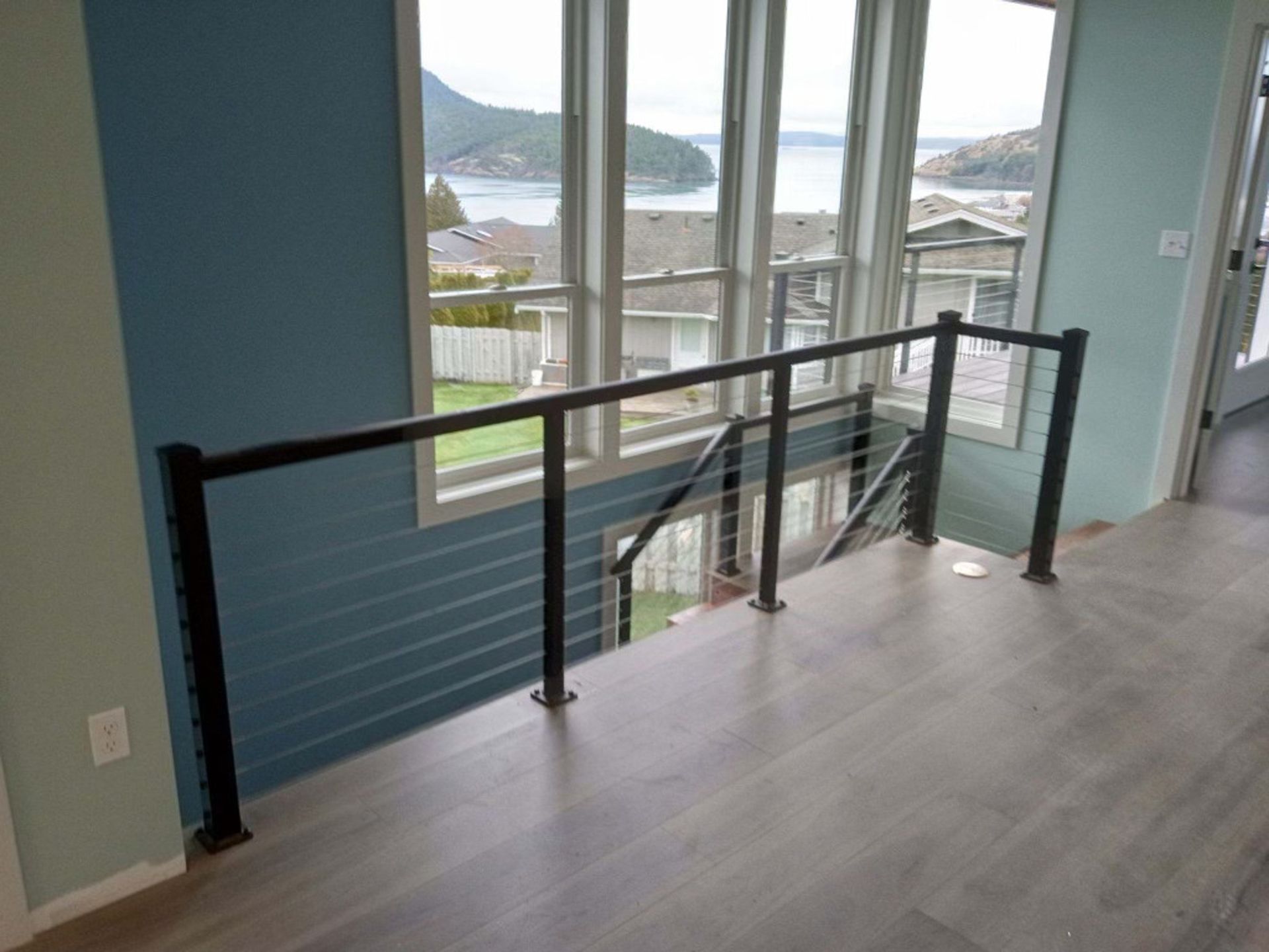 Custom-built stair railing installed