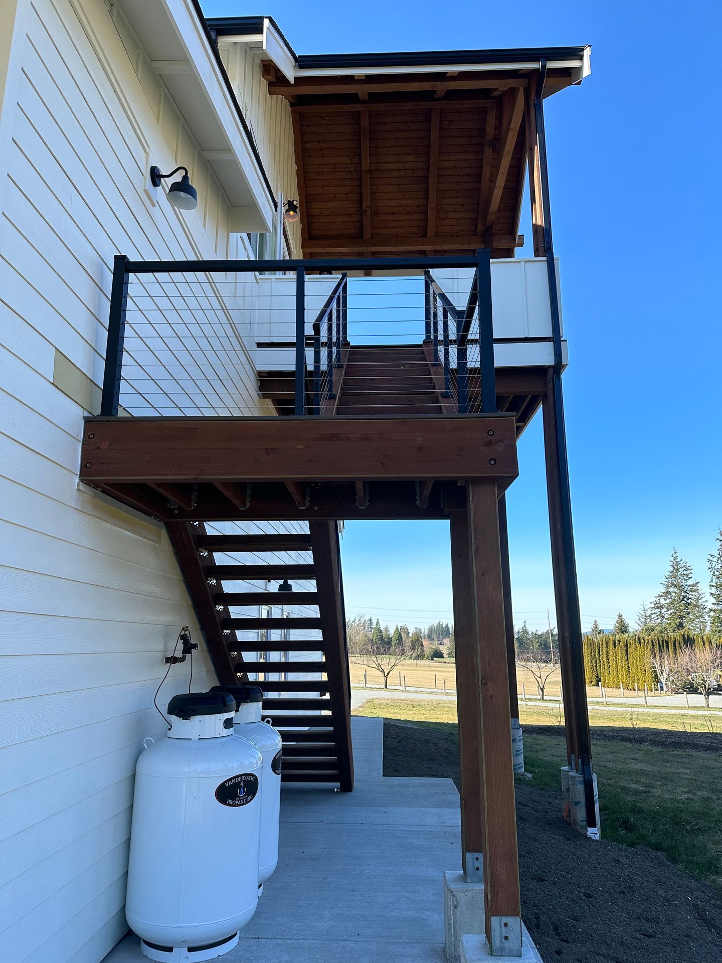 Newly brown stairs with cable railing
