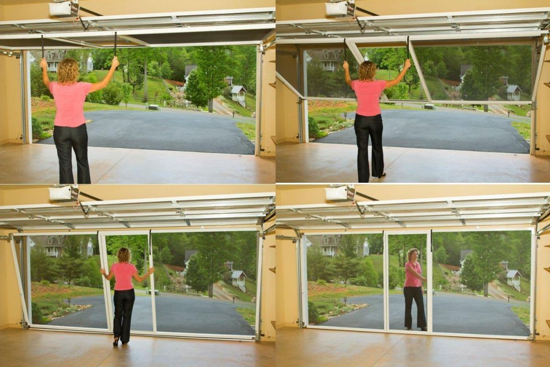 Woman opens garage door with screen, creating a screened-in space overlooking a driveway and greenery.