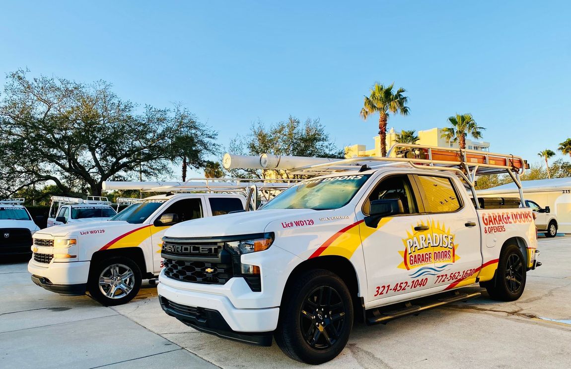 Paradise Garage Doors service trucks