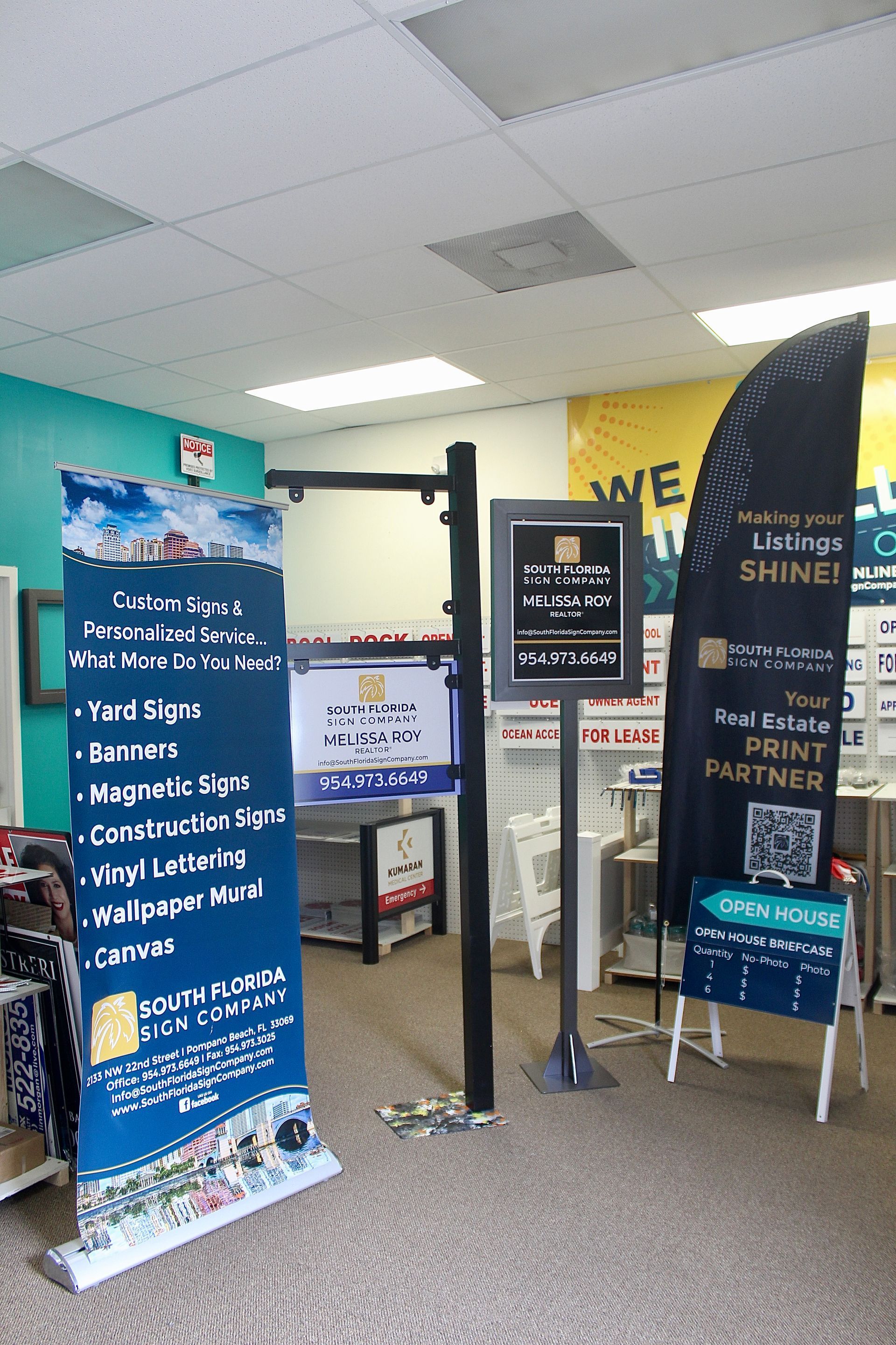 A room with a sign that says 'we create shine' on it