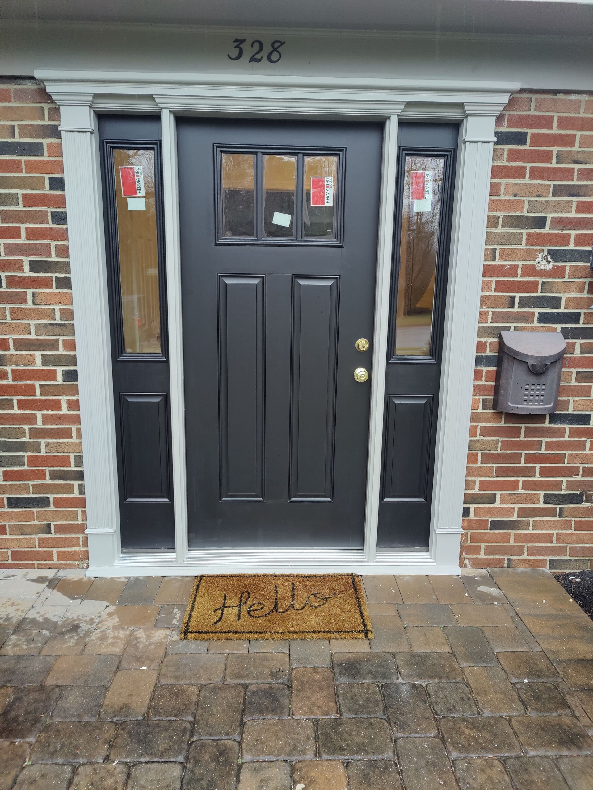 A black door with the number 528 on it.