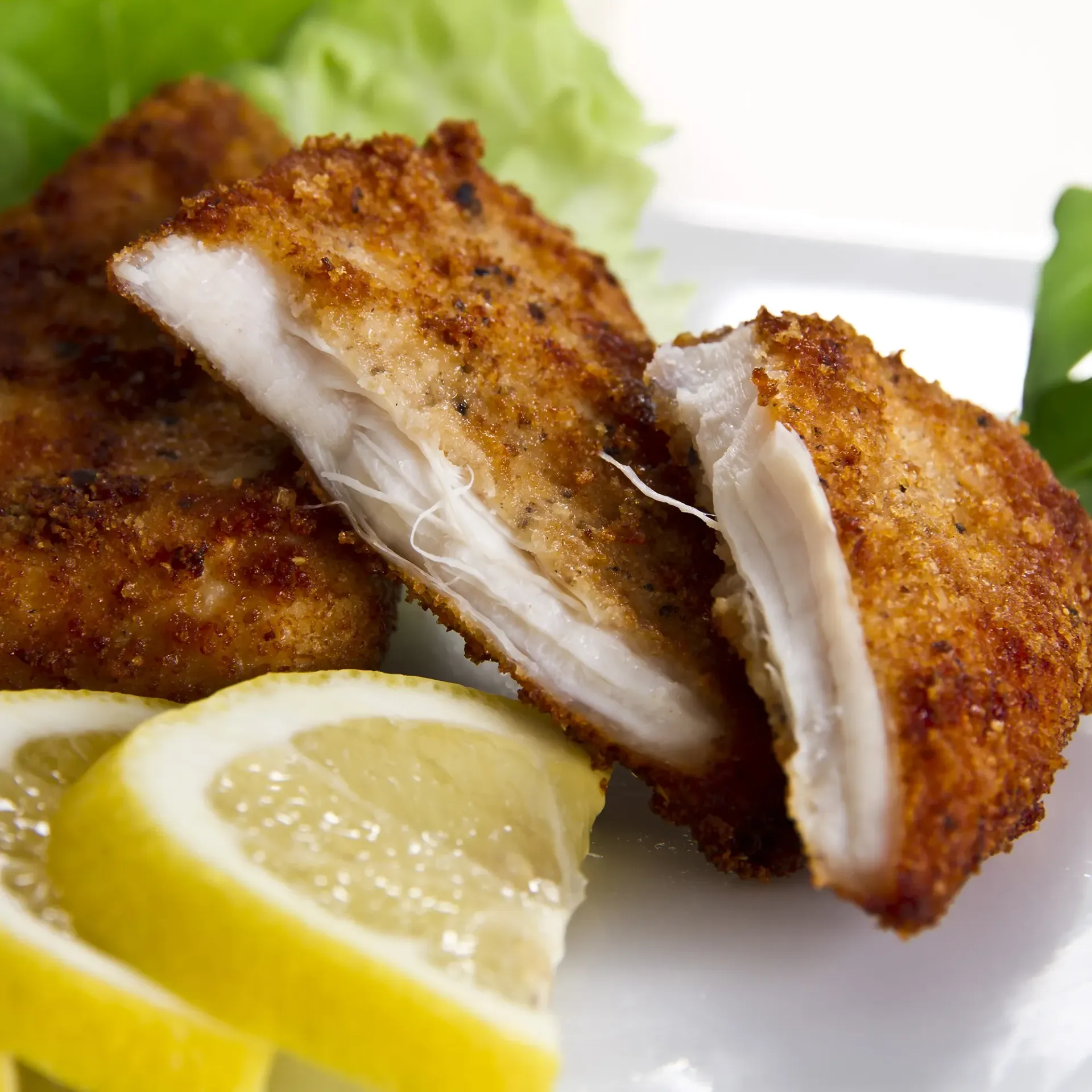 Chicken fillet cut on plate