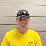 Smiling yellow face with open mouth and visible white teeth.