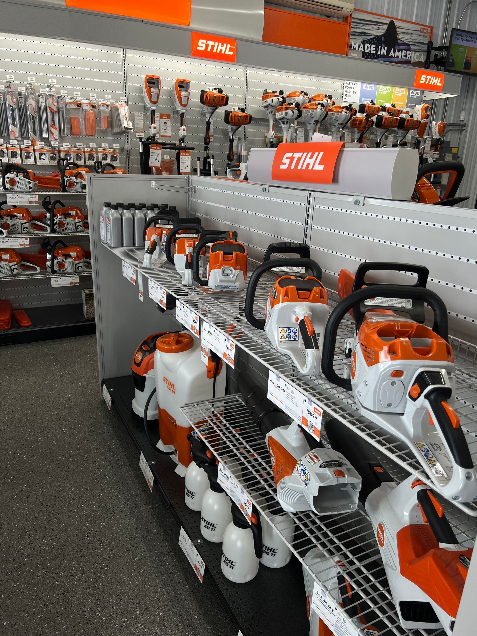 A store display of stihl chainsaws and sprayers