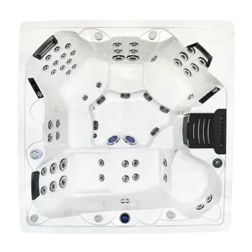 Top-down view of a white hot tub with multiple jets, black headrests, and a control panel on the right
