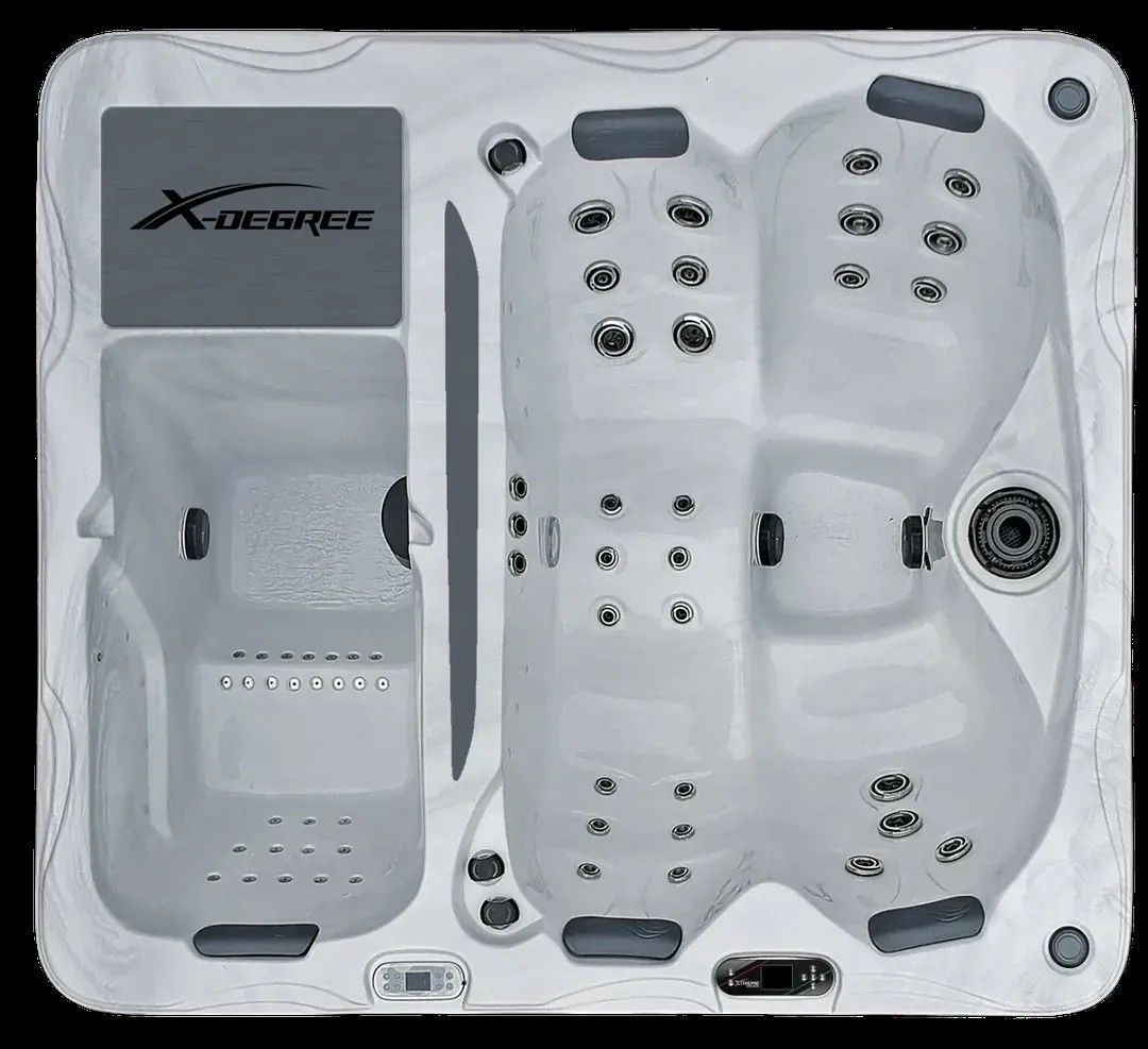 White spa hot tub with multiple jets and molded seats, viewed from above.
