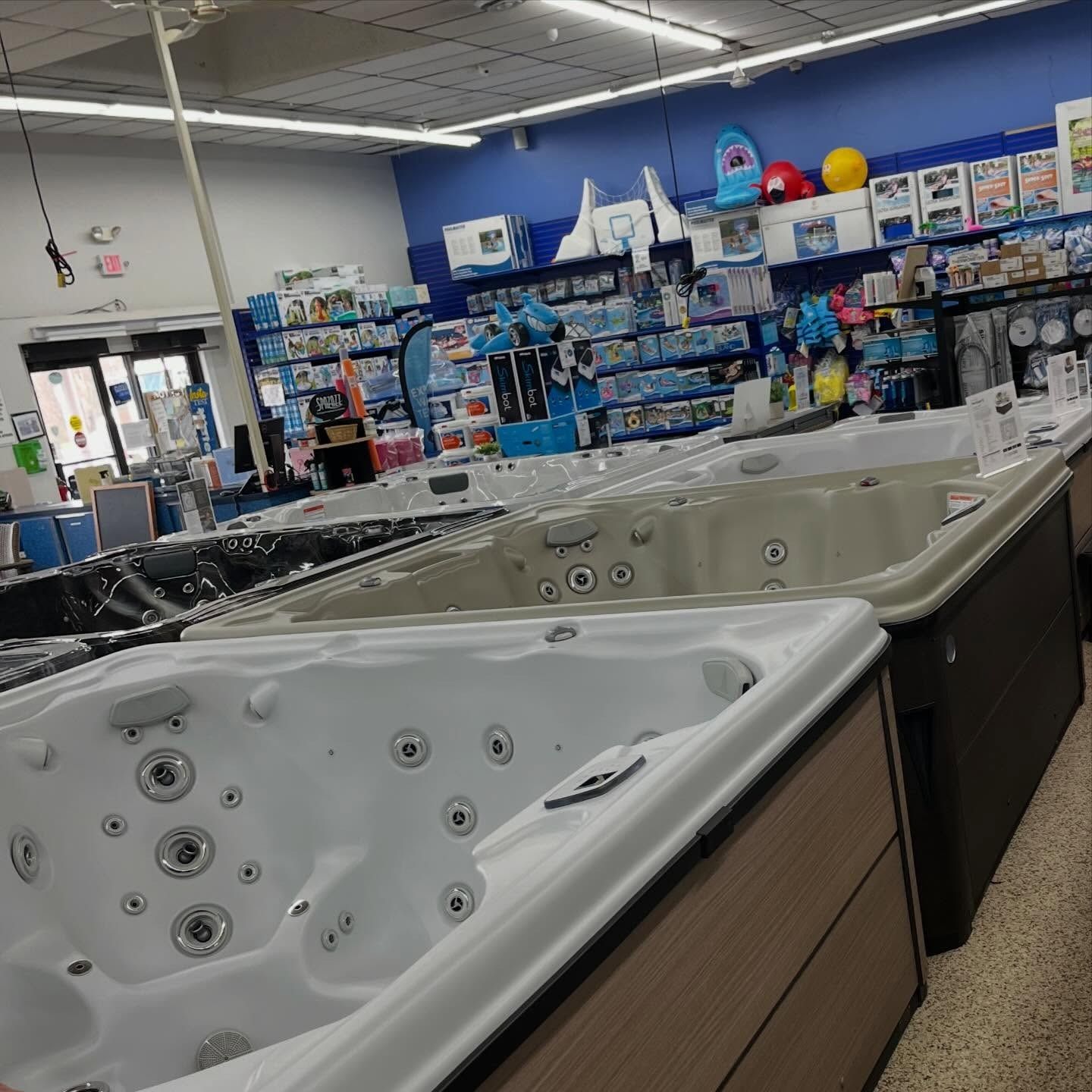 Showroom of hot tubs and spa accessories in a store