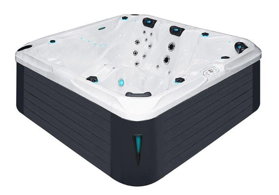 White square hot tub with black exterior and multiple jets on a white background