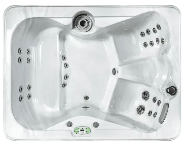 Top-down view of a white rectangular hot tub with multiple massage jets and contoured seats