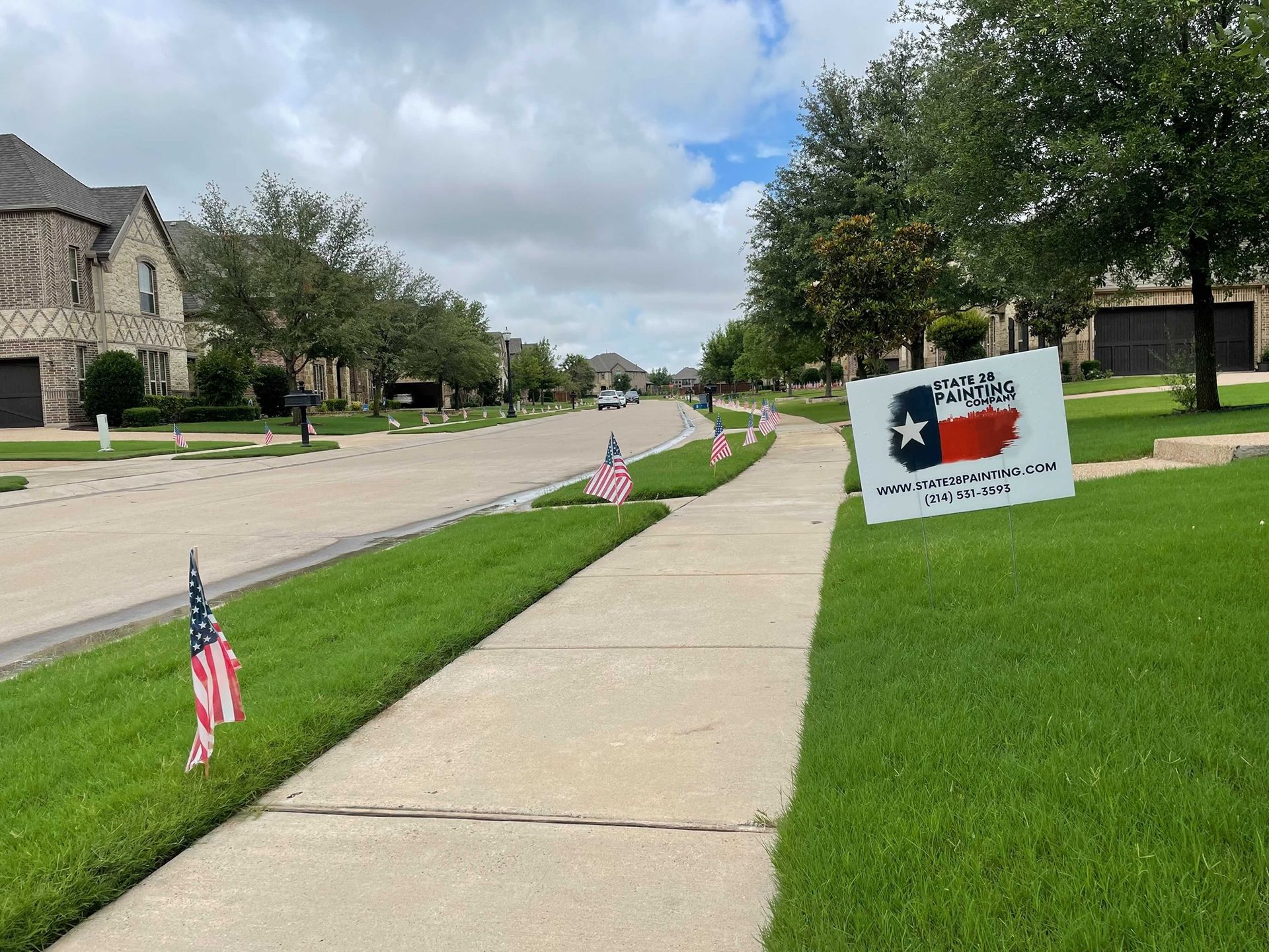 A sidewalk with a sign that says texas on it