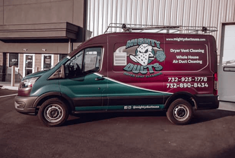 Mighty ducts dryer vent cleaning service van