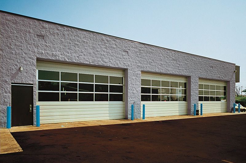 A building with a lot of garage doors on it