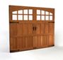 A wooden garage door with windows on a white background.